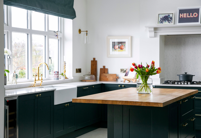 Dark Green Shaker Kitchen, U shaped with island breakfast bar. Designed by John Willox Kitchen Design