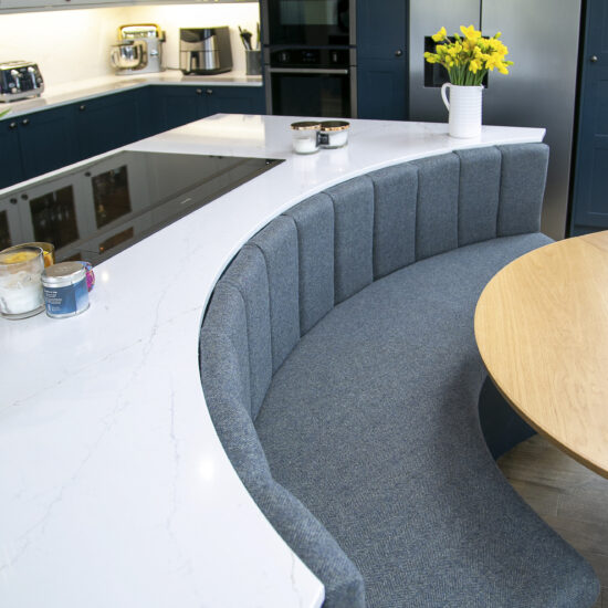 Circular Dining Booth built into the kitchen island. Tall Feature Image. Contemporary shaker style Kitchen. Design by John Willox Kitchen Design, Ellon, Aberdeenshire