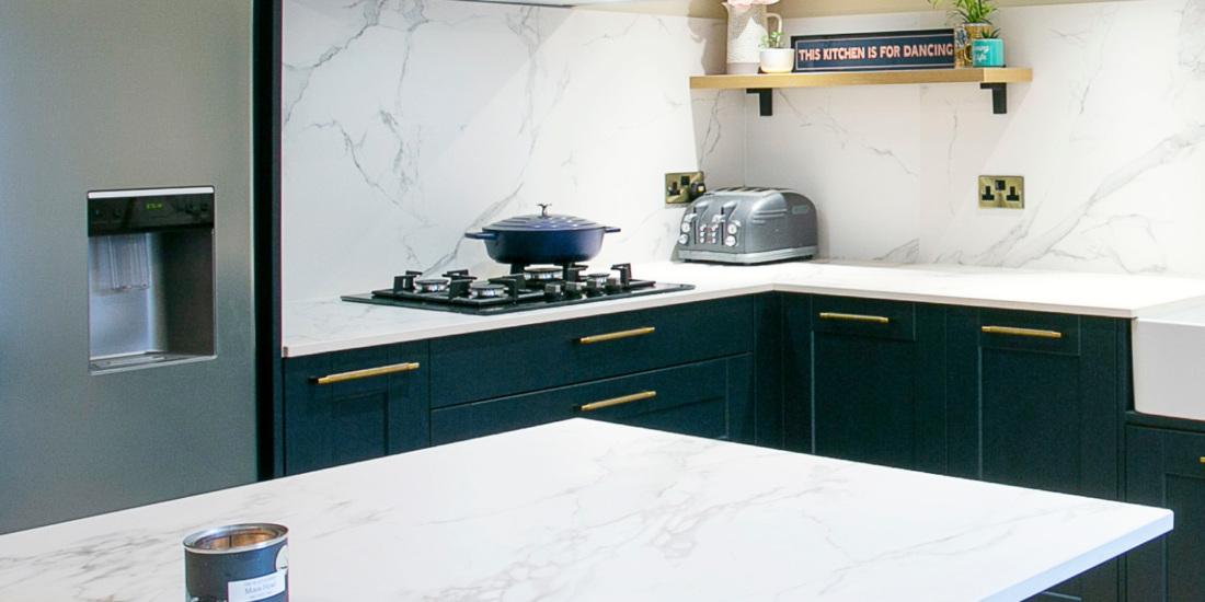 Dark Shaker Style Kitchen, Navy Kitchen, white marble style worktops and splashbacks - Tall Feature Image -Designed by John Willox Kitchen Design