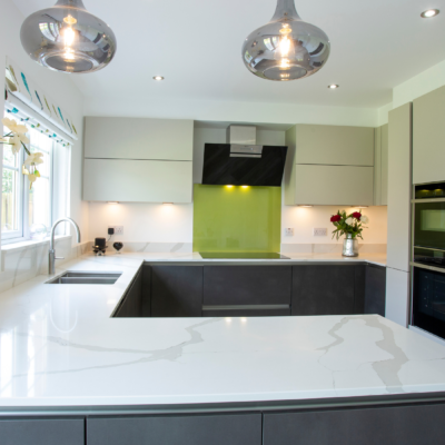 Two Tone Grey Matt Kitchen - U Shaped with peninsula - Lime green splash back, light and dark grey cabinets - John Willox Kitchen Design
