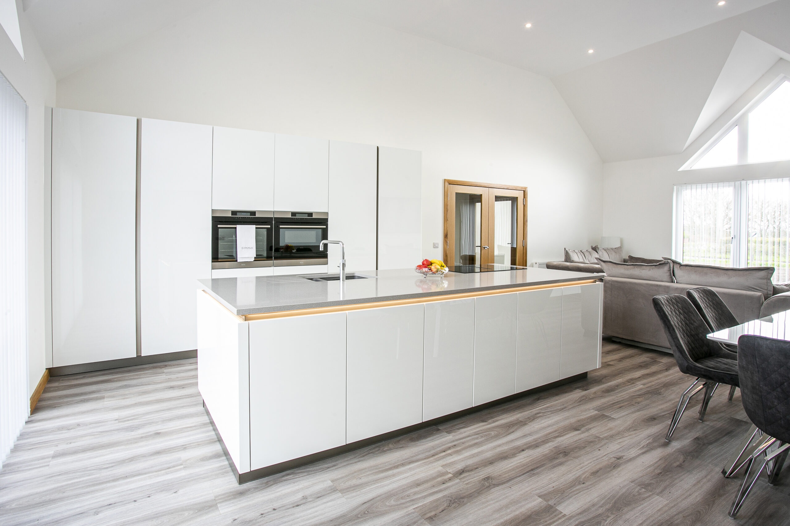 White Gloss Open Plan Kitchen by John Willox Kitchen Design