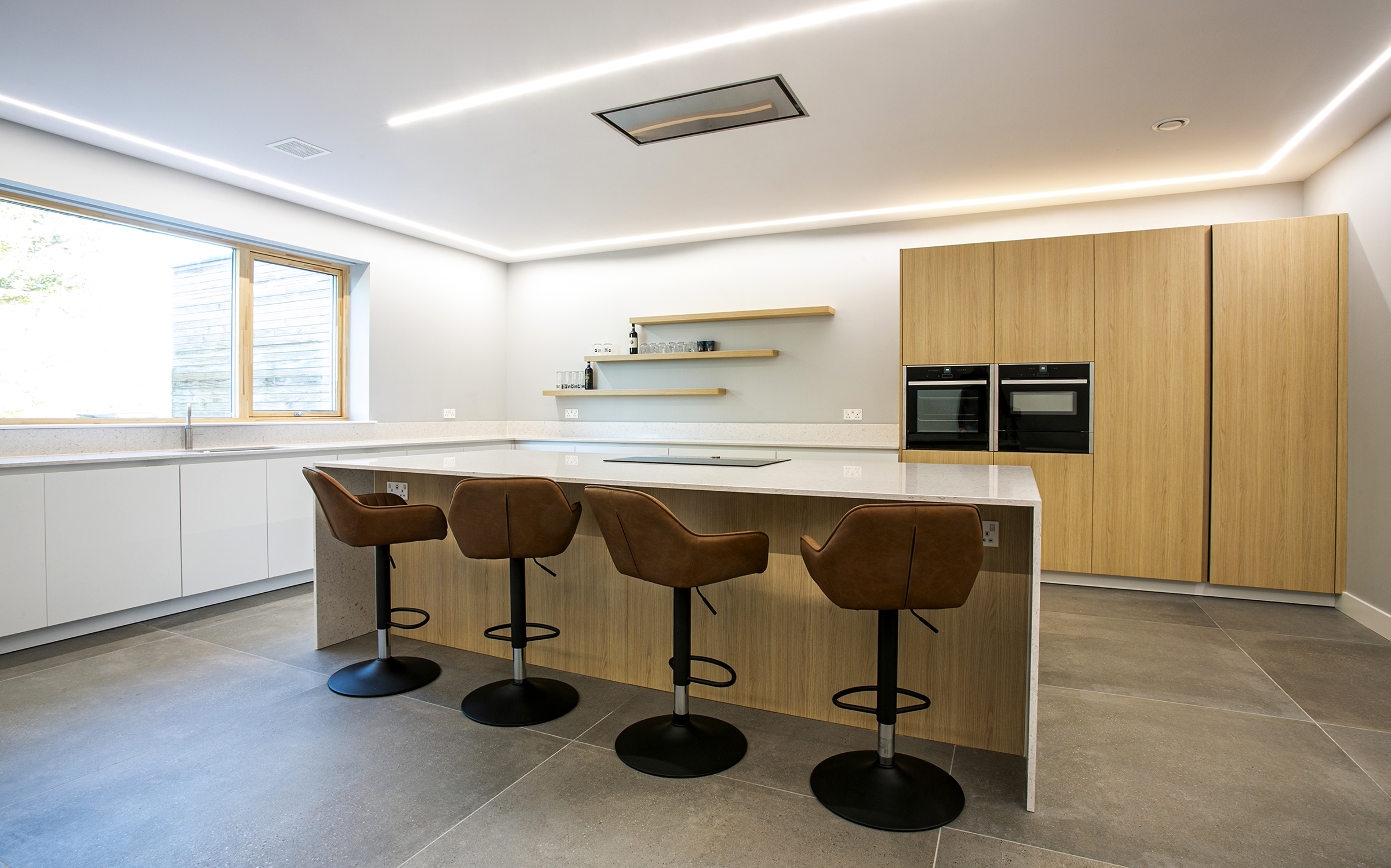 White with warm oak handless kitchen - designed by John Willox Kitchen Design