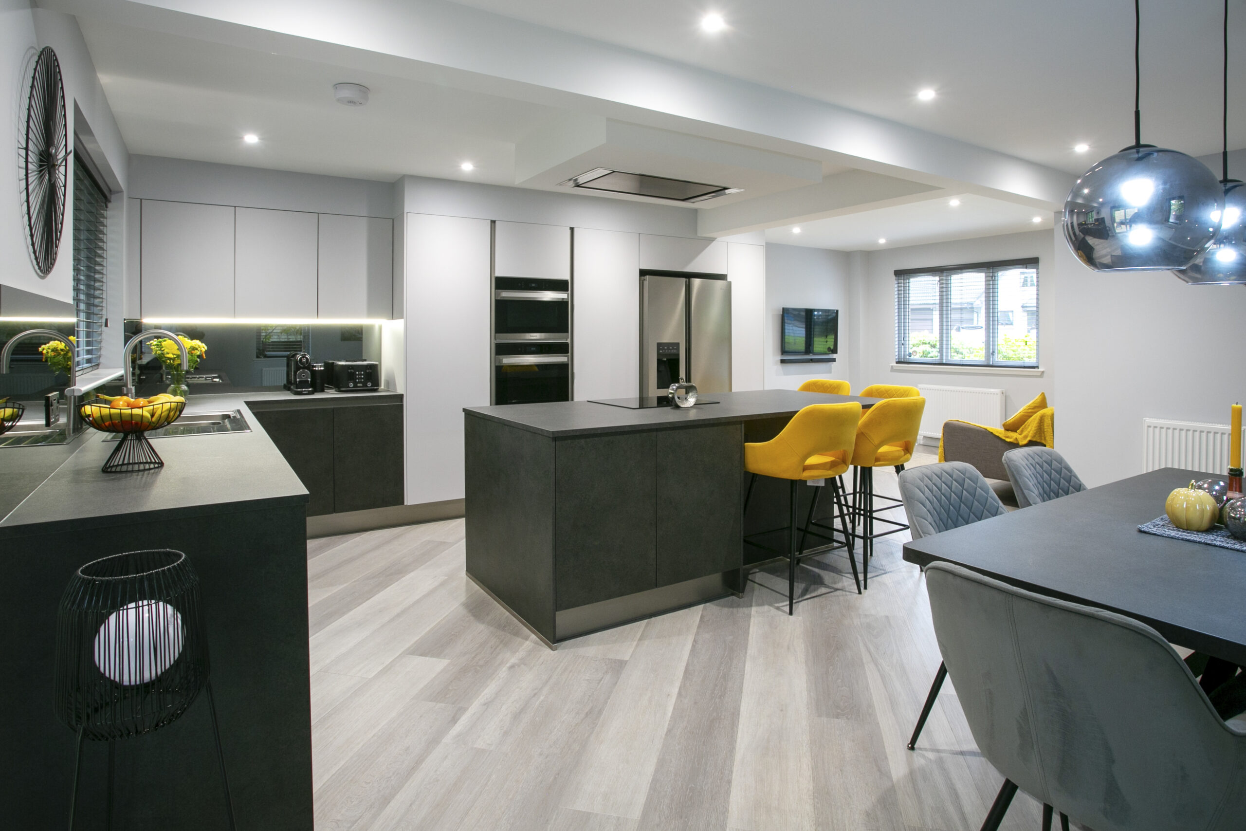 Kitchen Extension Aberdeen. Family Space. Kitchen, Dining, Living. John Willox Kitchen Design Aberdeen. Ellon. Mocca Kitchen. Grey Matt Kitchen. Smoked Mirror Splashback. Large L-Shaped Kitchen with Kitchen Island.