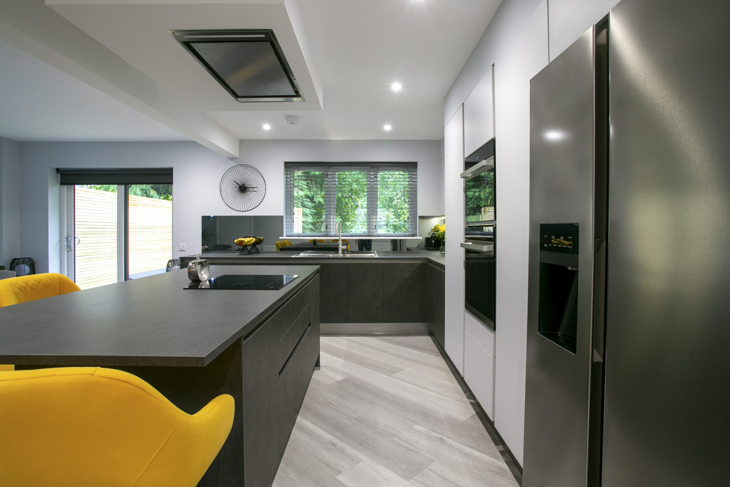 Kitchen Extension Aberdeen. John Willox Kitchen Design Aberdeen. Ellon. Mocca Kitchen. Grey Matt Kitchen. Smoked Mirror Splashback. Large L-Shaped Kitchen with Kitchen Island.