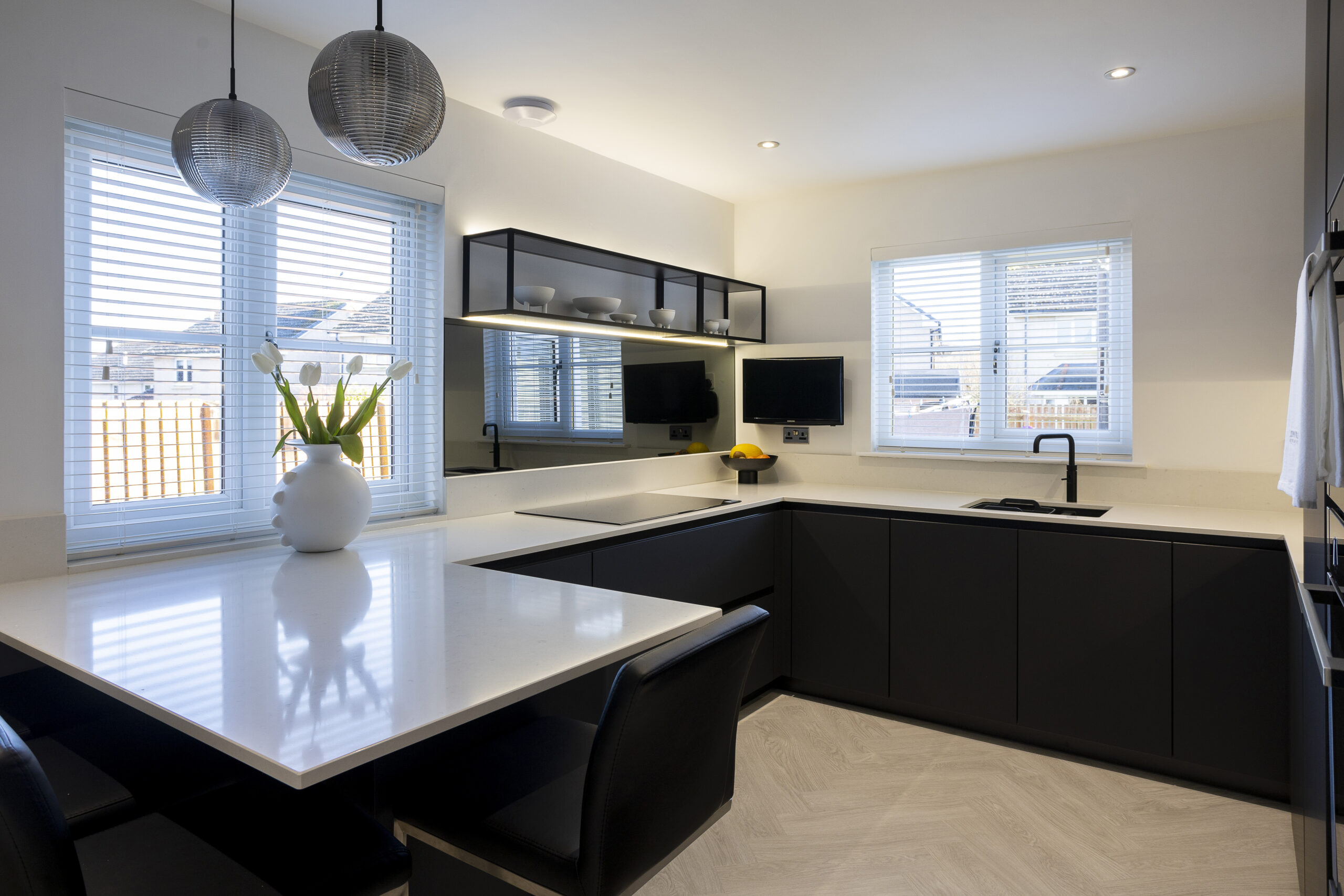 Black vs White Kitchen U shaped with breakfast bar by John Willox Kitchen Design, Ellon.