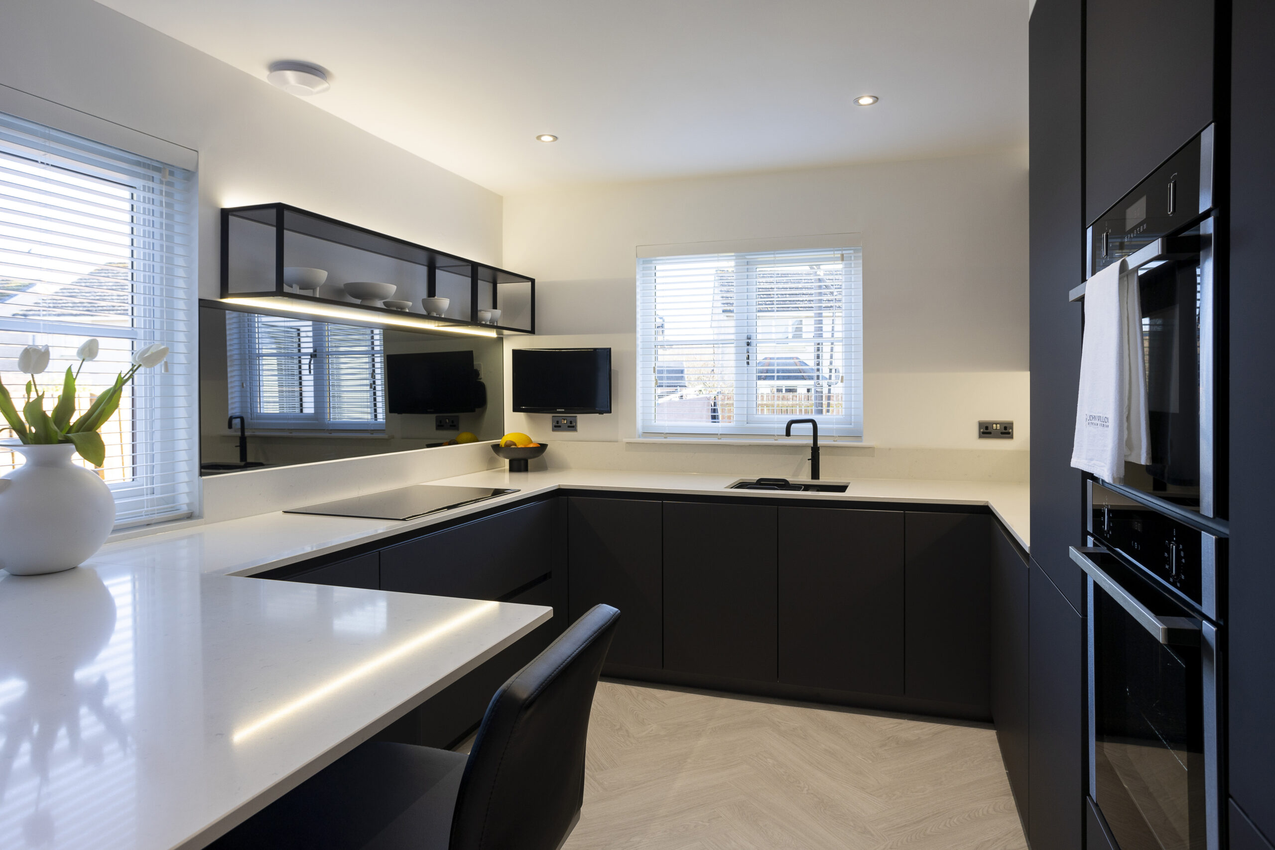 Black vs White Kitchen with NEFF appliances by John Willox Kitchen Design, Ellon.