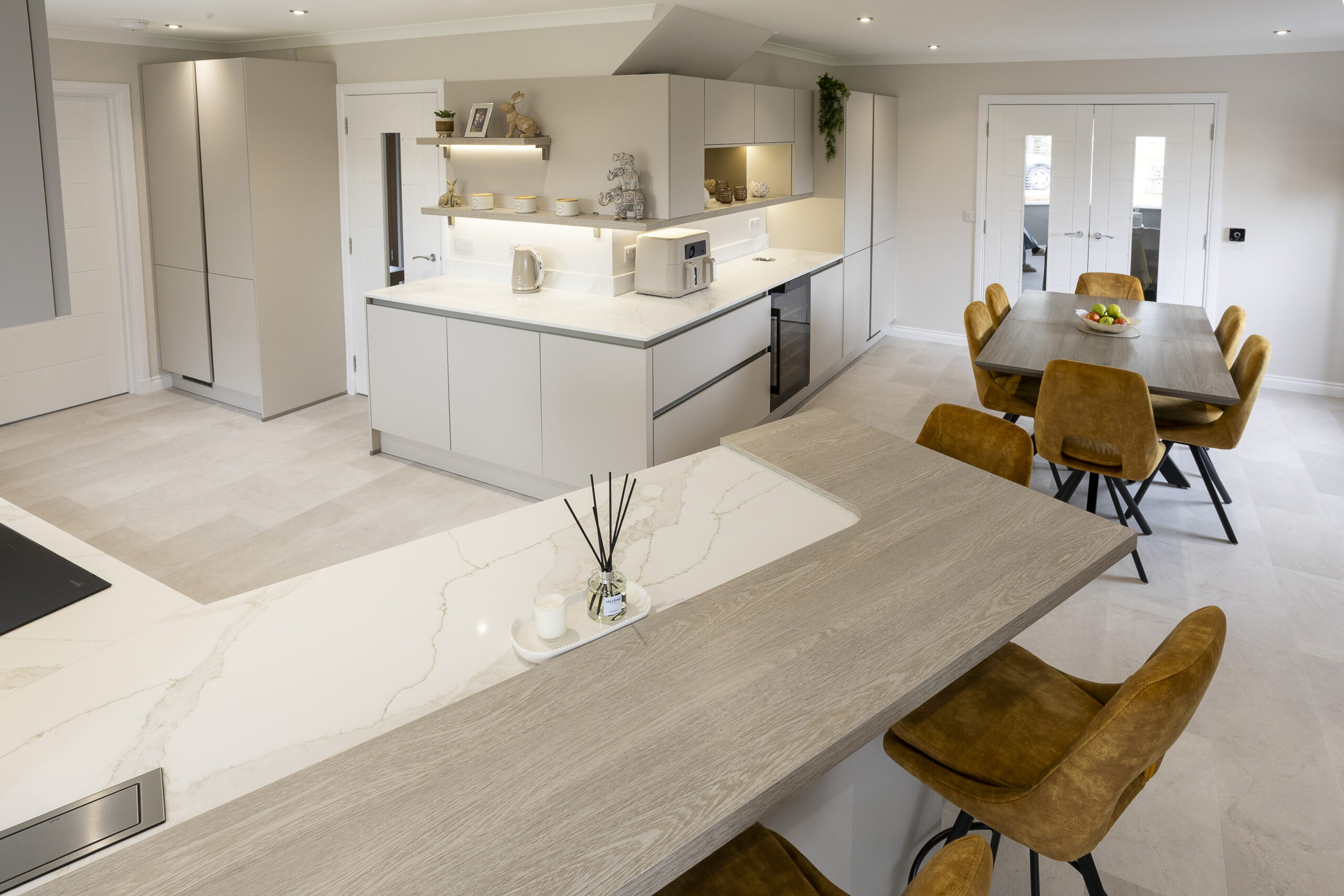 Kitchen, Dining, Living spaces. Family Focused Kitchen, Warm neutrals, John Willox Kitchen Design, Ellon, Aberdeen. Facebook Schema Image