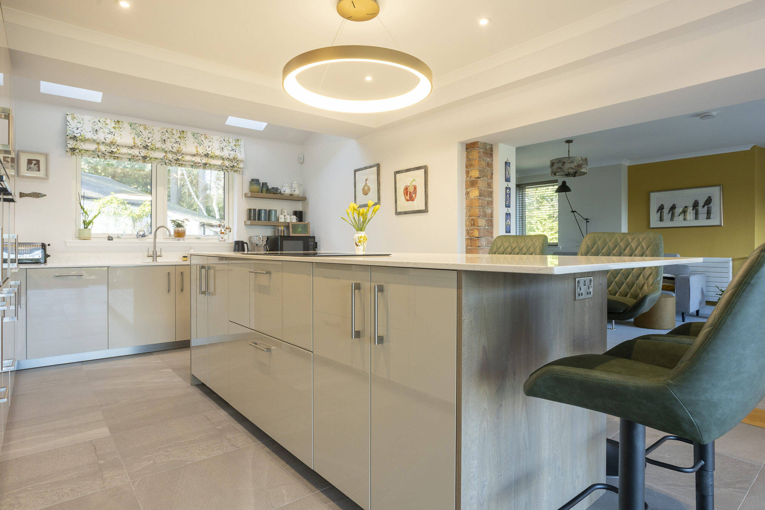 Island or peninsula? John Willox Project Story. Cream Kitchen with elevated taller island hight.