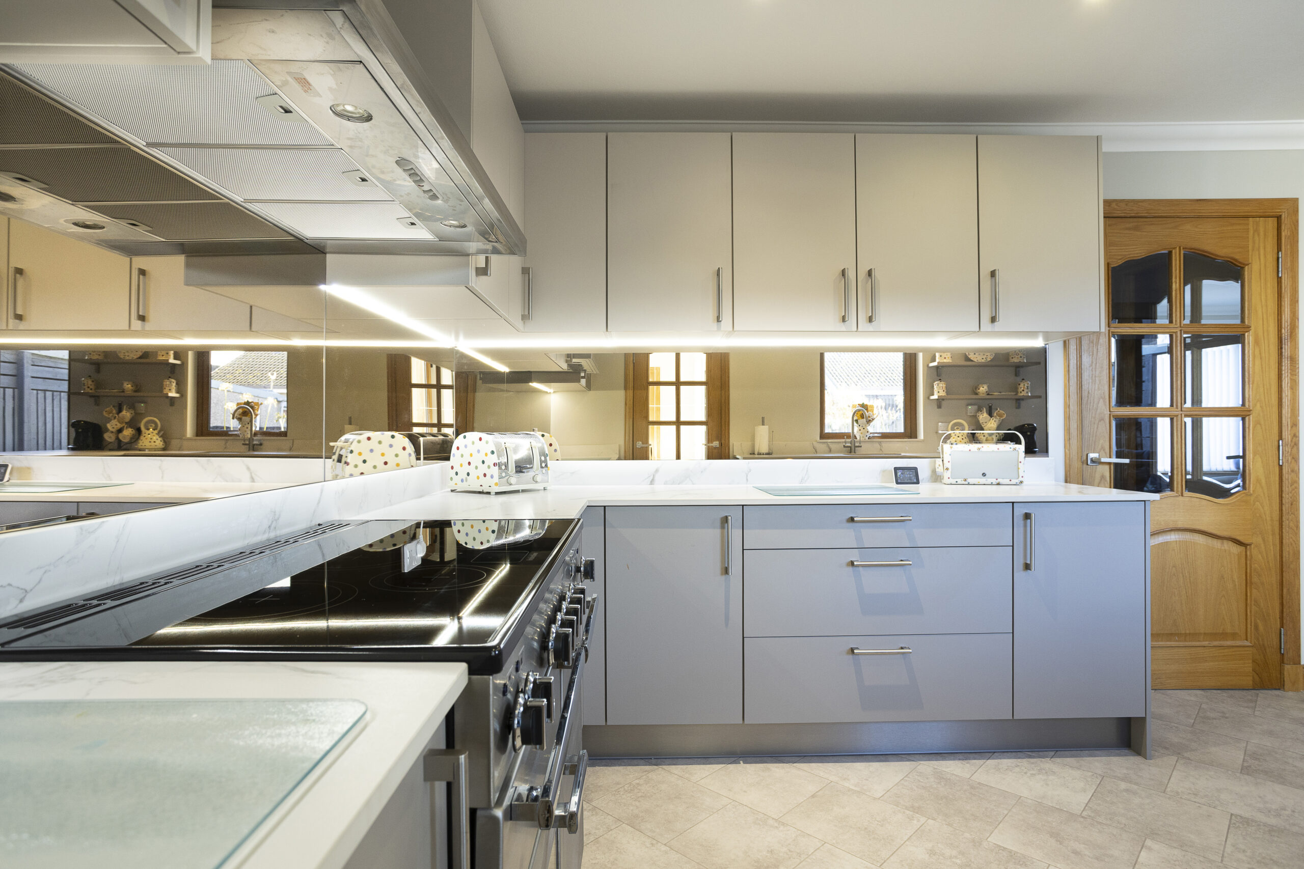 Quiet Elegance. John Willox Kitchen Design. Dekton Aura Worktops and Bronze mirror Splashback. Aberdeen Kitchen Project.